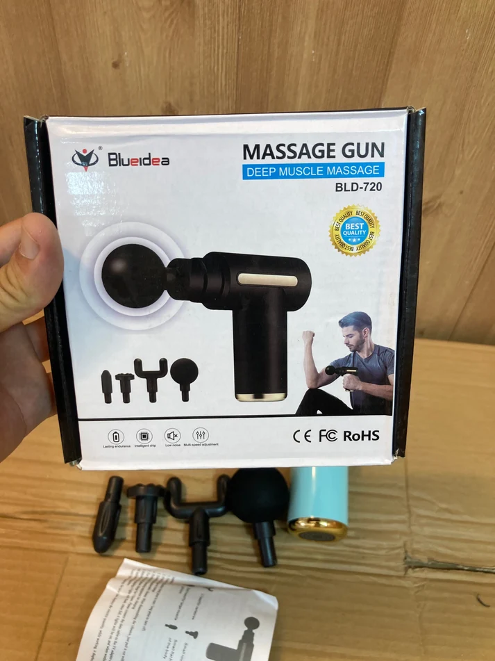 Massage gun and its interchangeable heads
